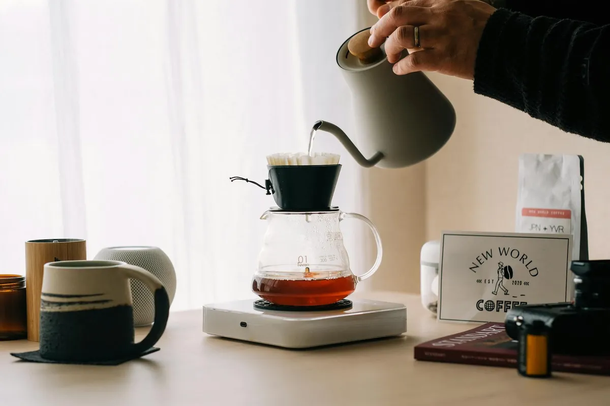 A pour-over coffee setup in warm morning light